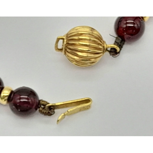 328 - A Beautiful Red Garnet, Pearl Necklace and Earring Set. 18k gold necklace clasp and earring backing.... 