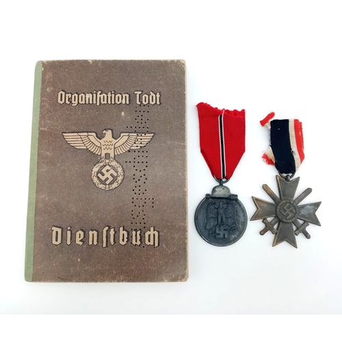 33 - RARE 3rd Reich Organisation Todt Dienst Buch (Service Book) with lots of stamped entries in his meda... 