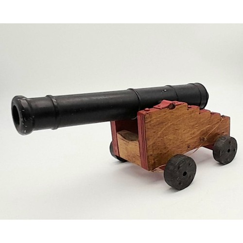 1210 - A Vintage Mid 20th Century Cast Iron and Wood Scratch Built Cannon 24cm Length.