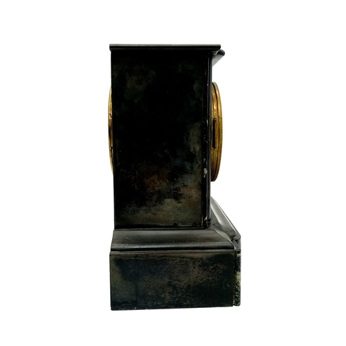 330 - An Antique Victorian Marble/Slate Mantel Clock. Comes with key. In good working order but because of... 