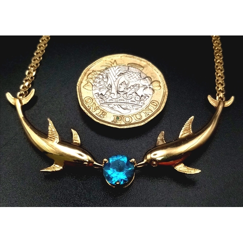 208 - 14k yellow gold dolphin necklace set with blue topaz (topaz:1.55ct)