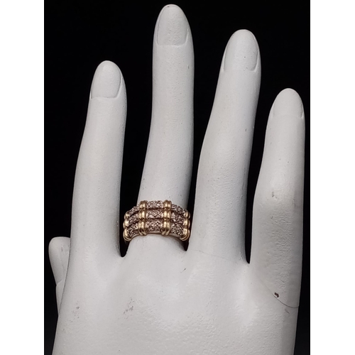 391 - 9K YELLOW GOLD DIAMOND SET 3 ROW BAMBOO RING 0.25CT 3.6G SIZE K