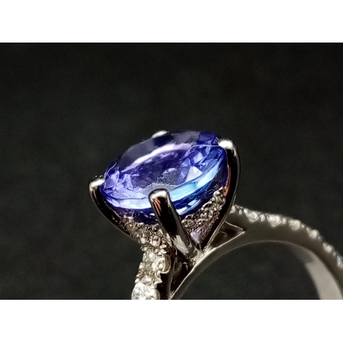 46 - 18K White Gold DIAMOND & TANZANITE RING 4G 1.50CT TANZANITE Size P.