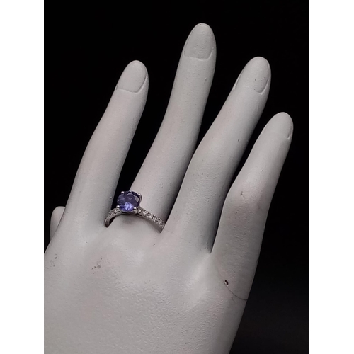 46 - 18K White Gold DIAMOND & TANZANITE RING 4G 1.50CT TANZANITE Size P.