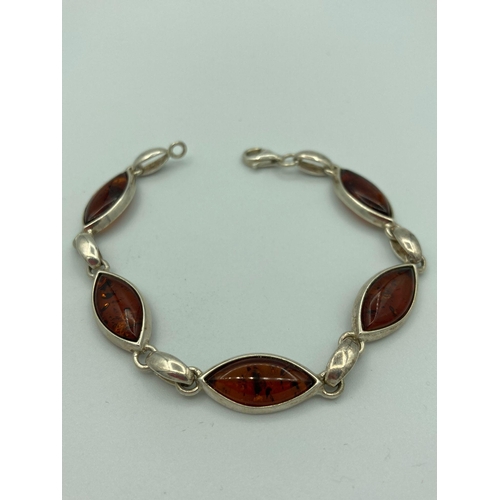 13 - Vintage SILVER and AMBER BRACELET Having the Amber stones set in Marquise shaped mounts.