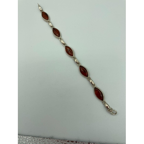 13 - Vintage SILVER and AMBER BRACELET Having the Amber stones set in Marquise shaped mounts.