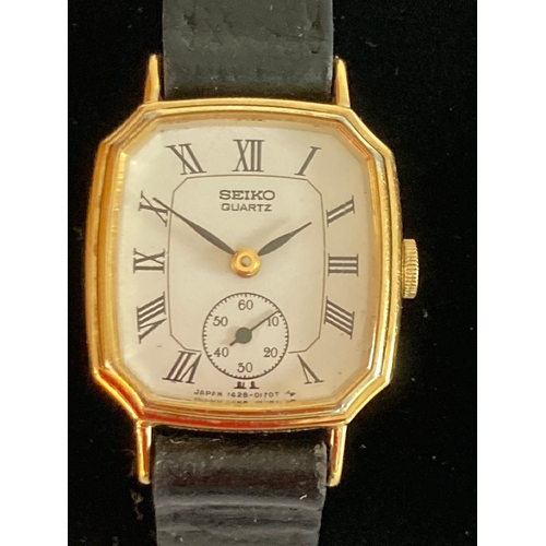 252 - Vintage ladies SEIKO QUARTZ 1428-5060 wristwatch. Having white face with Roman numerals and subsidia... 