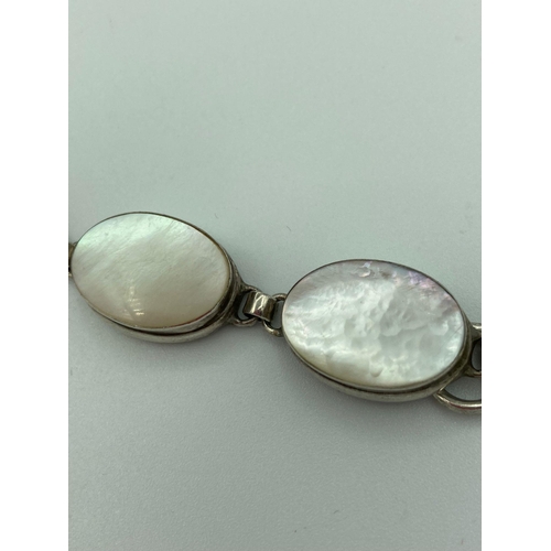 266 - 2 x VINTAGE SILVER BRACELETS set with agate and mother of pearl. T-bar fastening. No silver markings... 