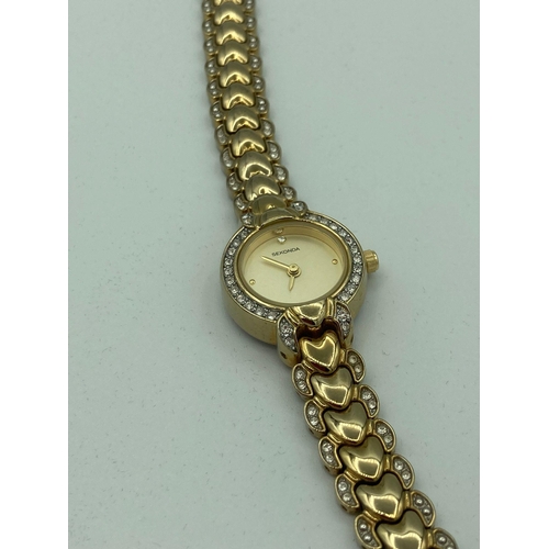 574 - Ladies SEKONDA 2061 Heart Bracelet wristwatch with crystal bezel and champagne dial. Quartz movement... 