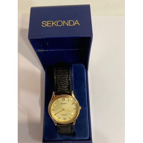 595 - Gentlemans SEKONDA 03270 Quartz wristwatch in gold tone with black lizard effect strap.Cream dial wi... 