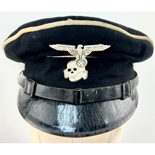 67 - WW2 German SS (Allgemeine) NCO’s Uniform Peaked Cap. Heavy black wool construction with white cotton... 