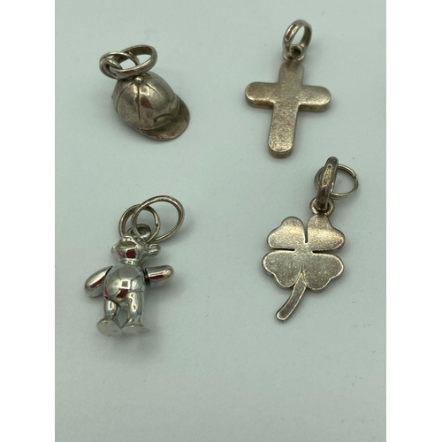 742 - Selection of Hallmarked SILVER CHARMS to include Dolphin, teddy bear, Dolly,etc. Full UK hallmarks. ... 