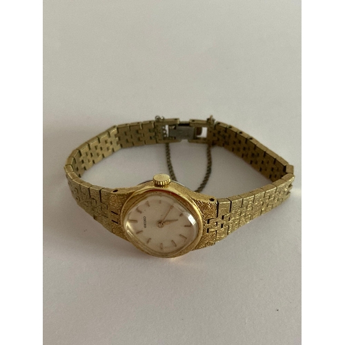 749 - Ladies vintage 1970’s SEIKO Wristwatch 11-8320 in gold tone. Gilded bracelet with safety chain. Manu... 