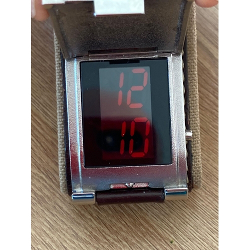 90 - Gentlemans  MARK ECKO Flip top digital watch mounted on an extremely wide brown leather strap. Full ... 
