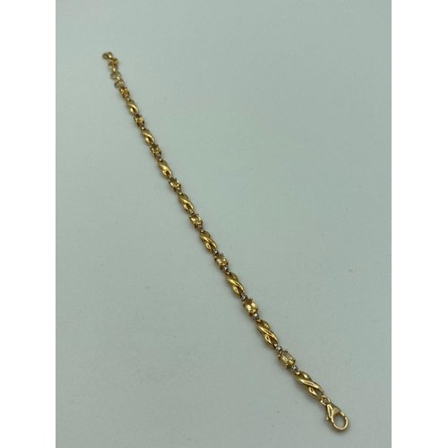 97 - SILVER TENNIS/LINE BRACELET,set with TOURMALINE and small DIAMONDS. Gilded to appear as gold. 19 cm.... 