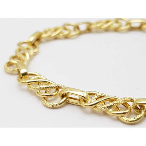 445 - 9K YELLOW GOLD FANCY LINK BRACELET 3.8G 20CM IN LENGTH.