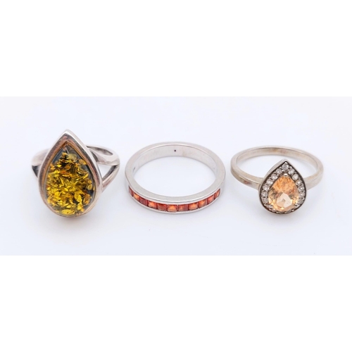 1207 - Three 925 Silver Gemstone Rings. Citrine, topaz and amber. Sizes I, O and P.