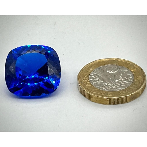 290 - A 27ct Ice-Blue Tanzanite Gemstone. Cushion-cut with 18 x 18 x 10mm dimensions. No visible inclusion... 