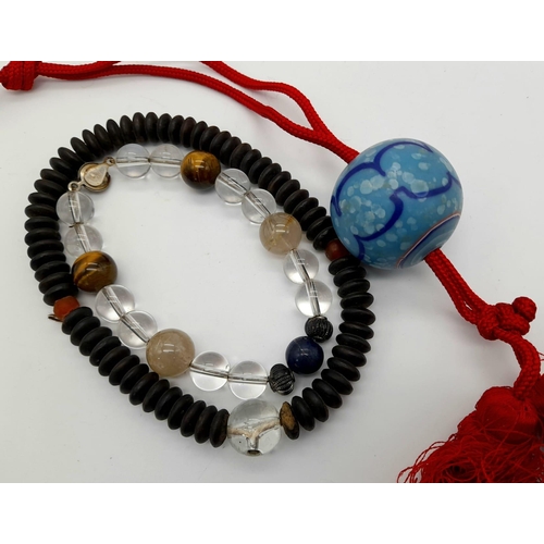 645 - A SELECTION OF ANTIQUE BUDDHIST PRAYER BEADS.