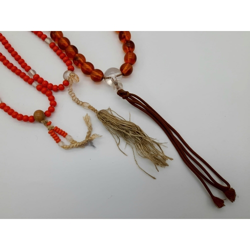 645 - A SELECTION OF ANTIQUE BUDDHIST PRAYER BEADS.