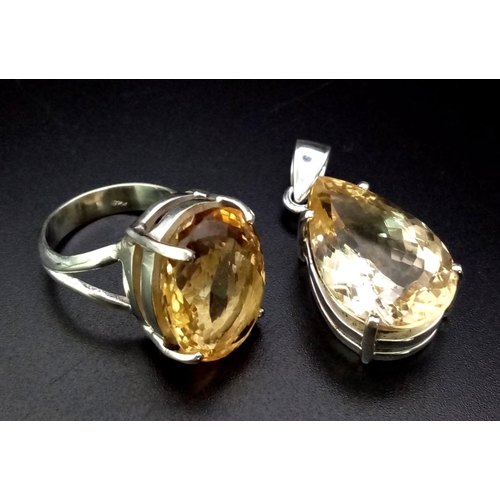 979 - 925 Silver Citrine pendant with Matching Ring. Total Weight 21.84g. Ring Size 0.