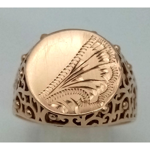 407 - A 14K Yellow Gold Signet Ring. Pierced side decoration. Size Z + 2. 6.2g. Ref: 6-2365.