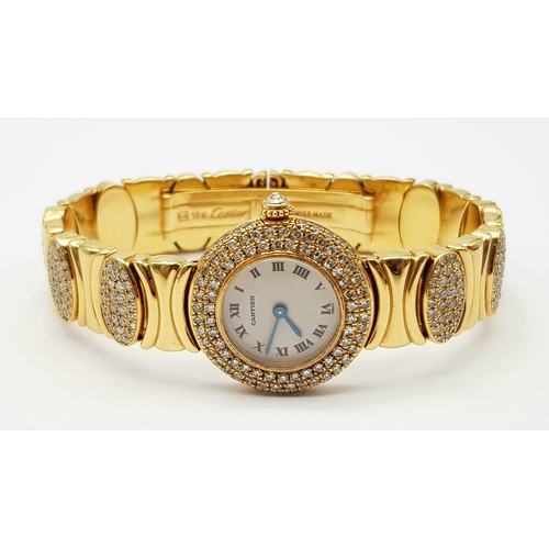 639 - CARTIER 18K GOLD WATCH, WITH DIAMOND BEZEL AND LINKAGE. QUARTZ MOVEMENT. 24MM. VERIFIED BY THE OFFIC... 