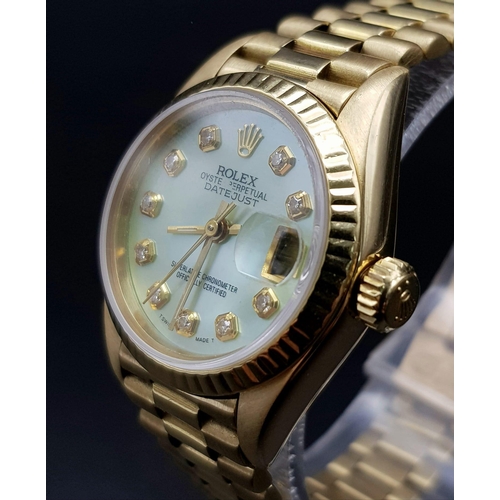 254 - 18K YELLOW GOLD LADIES ROLEX OYSTER PERPETUAL DATE JUST WATCH WITH MOTHER OF PEARL FACE AND DIAMOND ... 