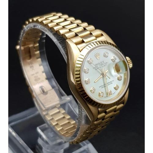 254 - 18K YELLOW GOLD LADIES ROLEX OYSTER PERPETUAL DATE JUST WATCH WITH MOTHER OF PEARL FACE AND DIAMOND ... 