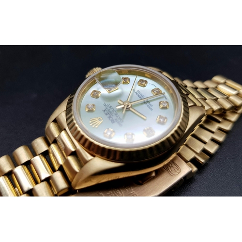 254 - 18K YELLOW GOLD LADIES ROLEX OYSTER PERPETUAL DATE JUST WATCH WITH MOTHER OF PEARL FACE AND DIAMOND ... 