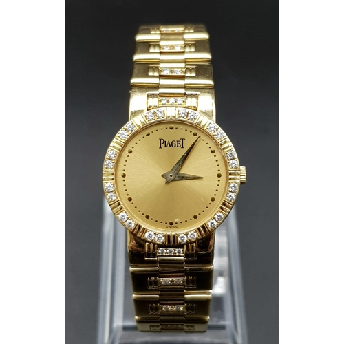 375 - PIAGET 18K GOLD QUARTZ LADIES WRISTWATCH, WITH DIAMOND BEZEL AND LINKAGE . SOLID 18K GOLD STRAP. QUA... 