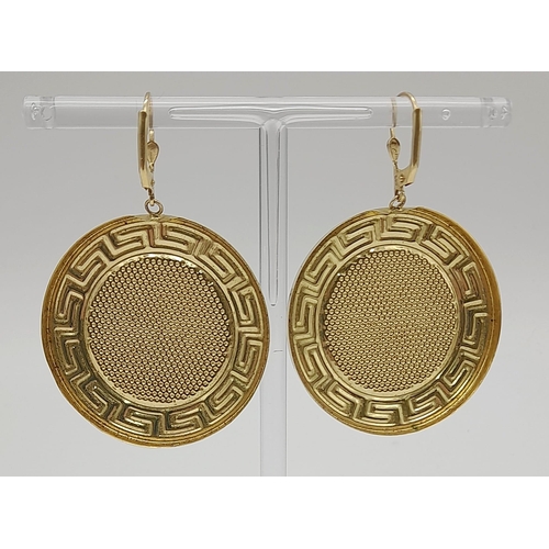 431 - A Pair of 14K Yellow Gold LV Disk Earrings. 4cm diameter. 10g total weight. Ref: 6-1731