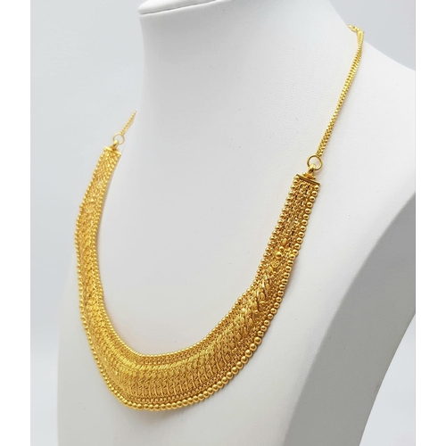 52 - An Asian 22k Yellow Gold Choker Necklace. 36cm. 30.5g. Ref: 5-714