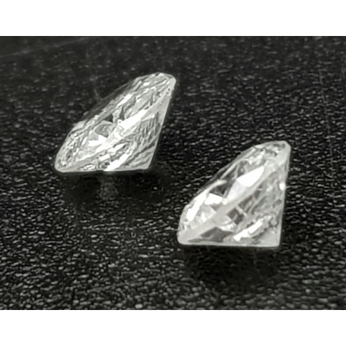 520 - PAIR OF ROUND BRILLIANT CUT DIAMONDS 0.32CT TOTAL