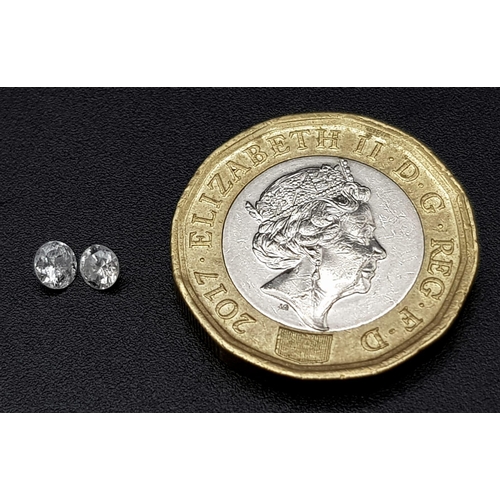 520 - PAIR OF ROUND BRILLIANT CUT DIAMONDS 0.32CT TOTAL