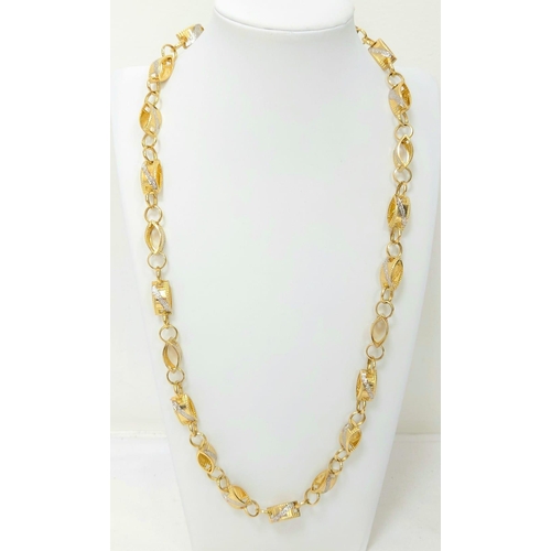 42 - A 14K  Yellow and White Gold Oval and Circle Link Chain. 60cm. 19.6g. Ref: 6-2440.