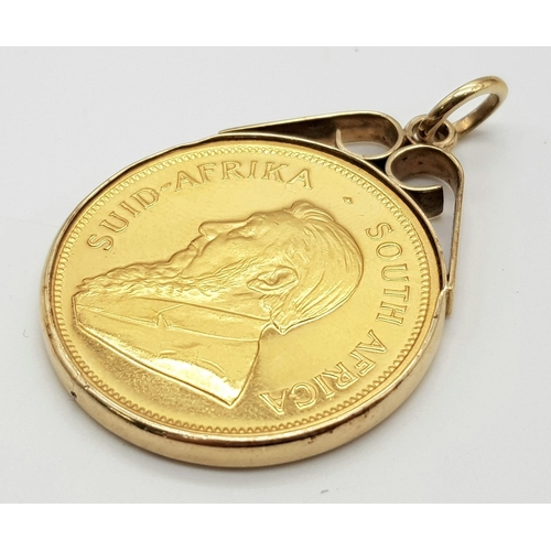 57 - A 1981 22k Krugerrand Coin in a 9K Gold Pendant Casing. Total weight - 37.56g.