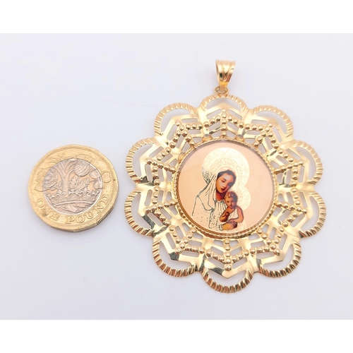 699 - A 14K Yellow Gold Religious Themed Pendant - 6cm and a Pair of 14K Yellow and White Gold Embossed La... 