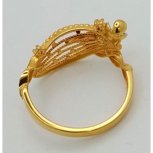 976 - 21K Gold Ring 2.9grams. Size N

3-13078