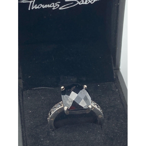 742 - SILVER THOMAS SABO RING,Having large faceted Black Stone set to top, with further black gemstones to... 