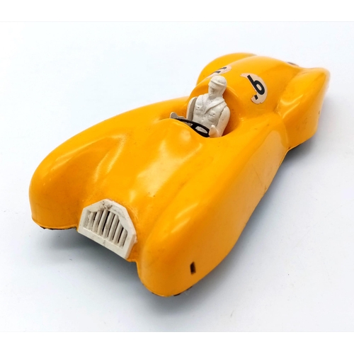 751 - A 1950's Jetex jet propelled racing car. In fair played with condition.