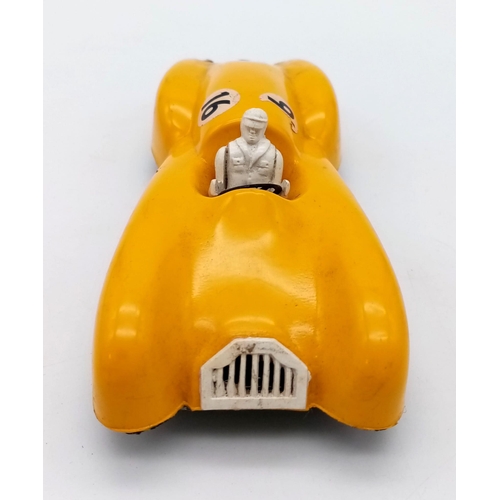 751 - A 1950's Jetex jet propelled racing car. In fair played with condition.