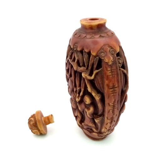 739 - A Chinese Hand-Carved Wood Perfume/Liquid Bottle. Wise elder decoration. 10cm high