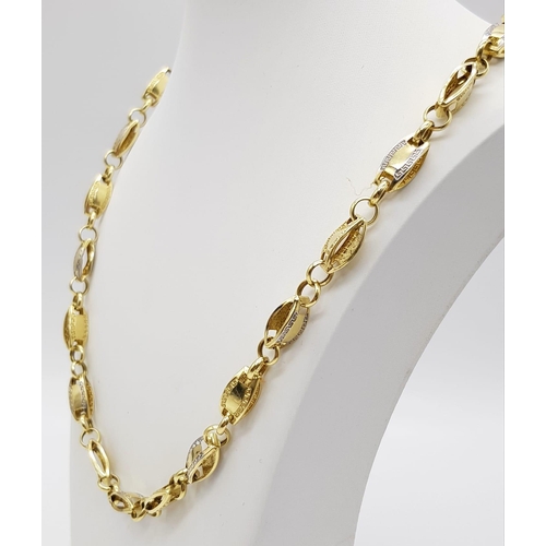 339 - A 14K Yellow and White Gold Chain. Rectangular and circular links. 60cm. 19.2g. Ref: 6-1697