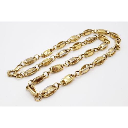 339 - A 14K Yellow and White Gold Chain. Rectangular and circular links. 60cm. 19.2g. Ref: 6-1697