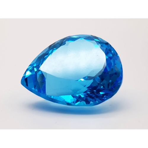79 - A Sublime 55ct Brazilian Blue Topaz.  Pear-cut, with no visible inclusions. Wonderfully faceted with... 