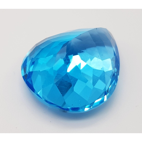 79 - A Sublime 55ct Brazilian Blue Topaz.  Pear-cut, with no visible inclusions. Wonderfully faceted with... 