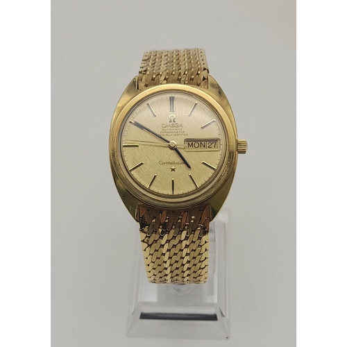 41 - A Vintage 18K Solid Gold Omega Constellation Automatic Gents watch. Solid gold strap and case - 36mm... 