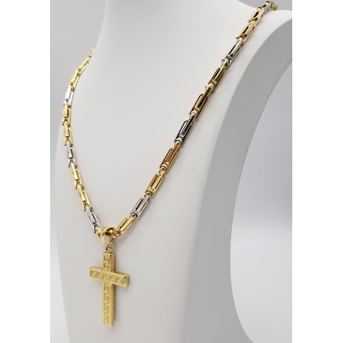 125 - An 18K Yellow and White Gold Chain and Cross Pendant. Large rectangular links. Geometric pattern on ... 