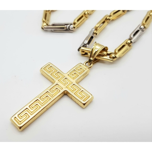 125 - An 18K Yellow and White Gold Chain and Cross Pendant. Large rectangular links. Geometric pattern on ... 